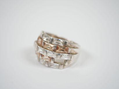 Two metal rings, one with five rows of white...