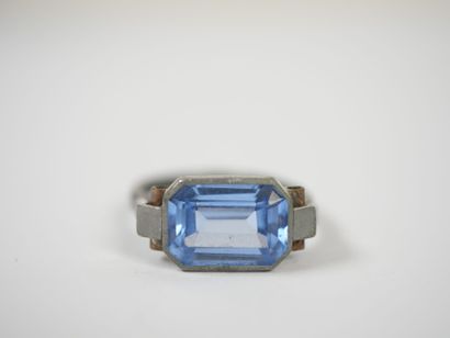 Silver ring set with a probable emerald-cut...