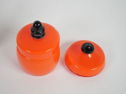 Orange-colored glass toiletry set including...