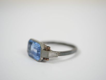 Silver ring set with a probable emerald-cut...