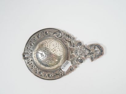 Foreign silver tea-pot decorated with cherubs...