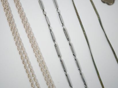Lot of metal and silver costume jewelry including...