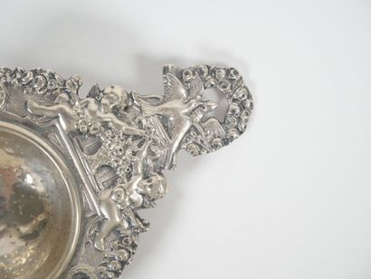 Foreign silver tea-pot decorated with cherubs...