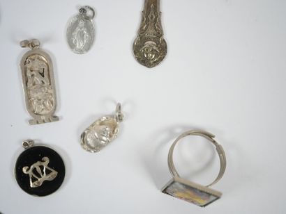 Lot of metal and silver costume jewelry including...