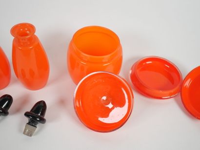 Orange-colored glass toiletry set including...