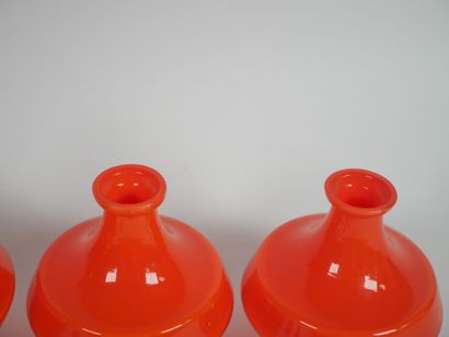 Orange-colored glass toiletry set including...