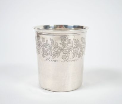 A Minerve-cut silver tumbler with chased...