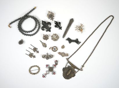 Lot of metal costume jewelry including mechanical...