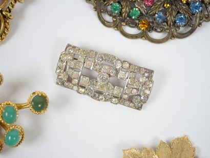 Set of 11 fancy metal and gilded metal brooches...