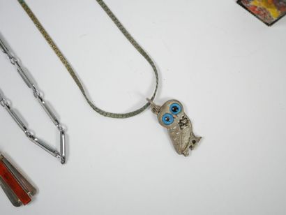 Lot of metal and silver costume jewelry including...