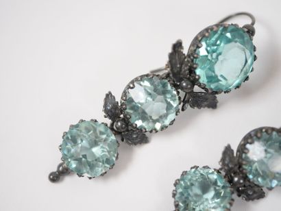 Metal and blue glass bead set with claw-set...