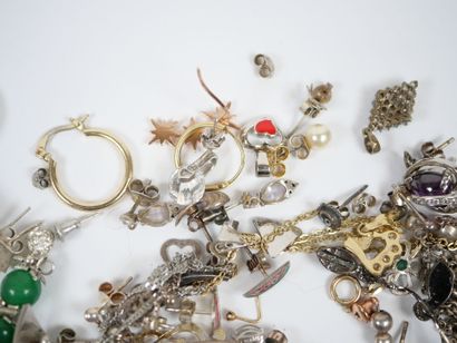 Lot of metal and silver costume jewelry including...