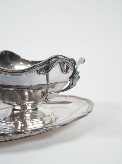 Sauce boat on its fixed silver display stand,...