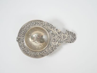 Foreign silver tea-pot decorated with cherubs...