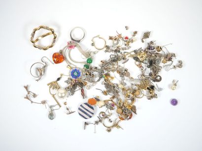 Lot of metal and silver costume jewelry including...