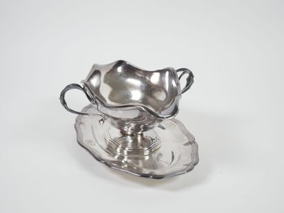 Sauce boat on its fixed silver display stand,...