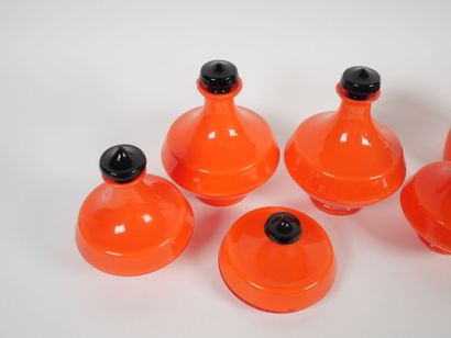 Orange-colored glass toiletry set including...