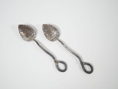 Set of four openwork silver salerons decorated...