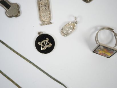 Lot of metal and silver costume jewelry including...