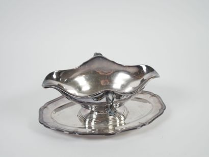 Sauce boat on its fixed silver display stand,...