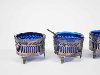 Set of four openwork silver salerons decorated...