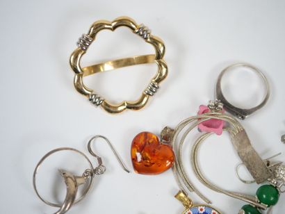 Lot of metal and silver costume jewelry including...