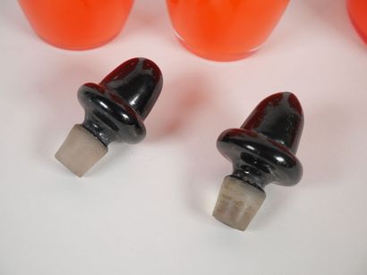 Orange-colored glass toiletry set including...