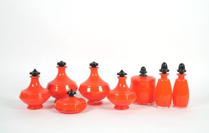 Orange-colored glass toiletry set including...
