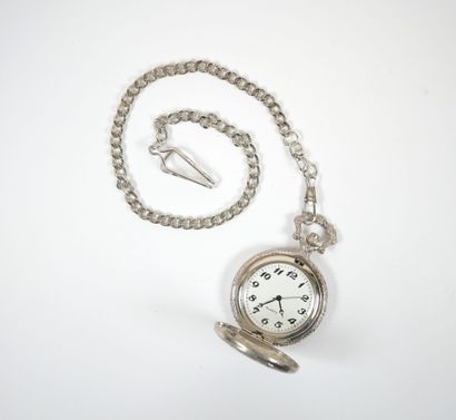 Metal pocket watch with chased decoration...