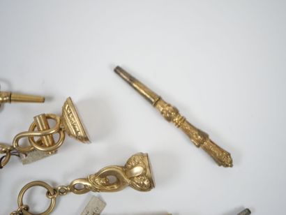 Set of seven gilt metal watch keys, some...