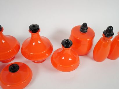 Orange-colored glass toiletry set including...