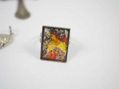 Lot of metal and silver costume jewelry including...