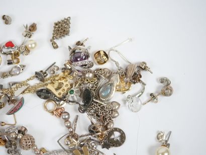 Lot of metal and silver costume jewelry including...