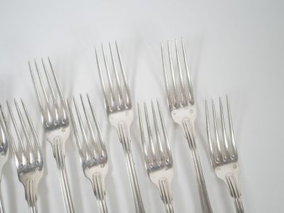 Set of eight silver forks and four silver...