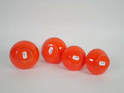 Orange-colored glass toiletry set including...