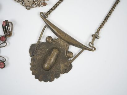 Lot of metal costume jewelry including mechanical...