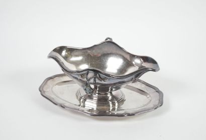 Sauce boat on its fixed silver display stand,...