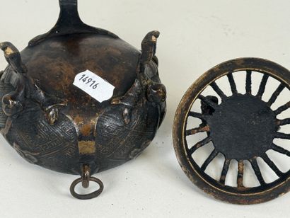 ASIA, 20th century.
Tripod openwork bronze...