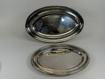 Two large oval silver-plated serving dishes.
54...