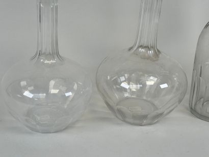 Set of four crystal and glass decanters.
Late...