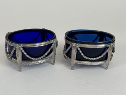 Pair of silver-plated salt cellars with cord...