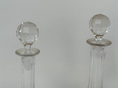Set of four crystal and glass decanters.
Late...