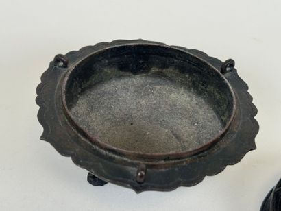 ASIA, 20th century.
Tripod openwork bronze...