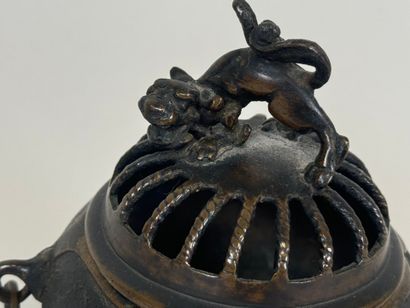 ASIA, 20th century.
Tripod openwork bronze...