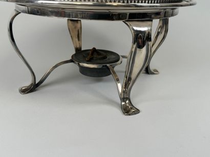 Silver-plated metal teapot holder decorated...