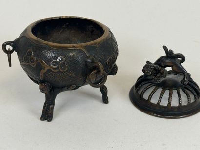 ASIA, 20th century.
Tripod openwork bronze...
