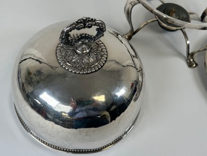 Silver-plated metal teapot holder decorated...