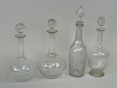 Set of four crystal and glass decanters.
Late...