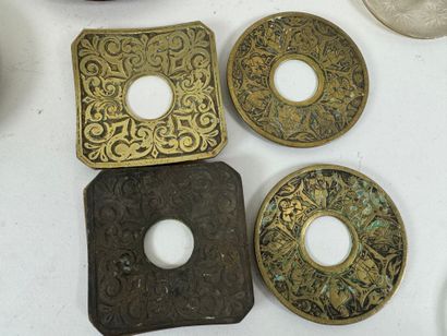 Set of glass, brass and chased bronze bobèches.
D....