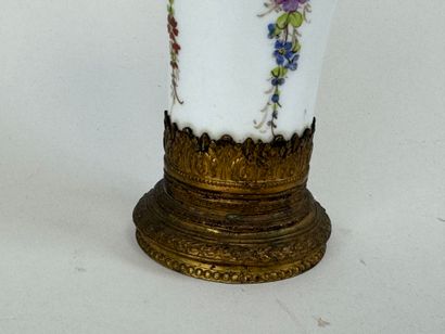 A polychrome porcelain vase decorated with...
